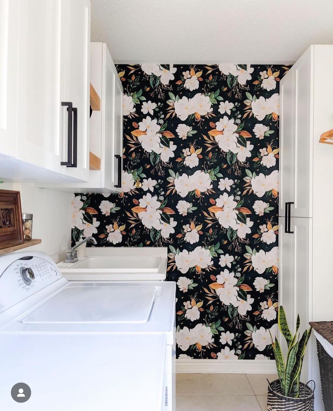 Deep botanical green Gold Magnolia wallpaper in a customer laundry room