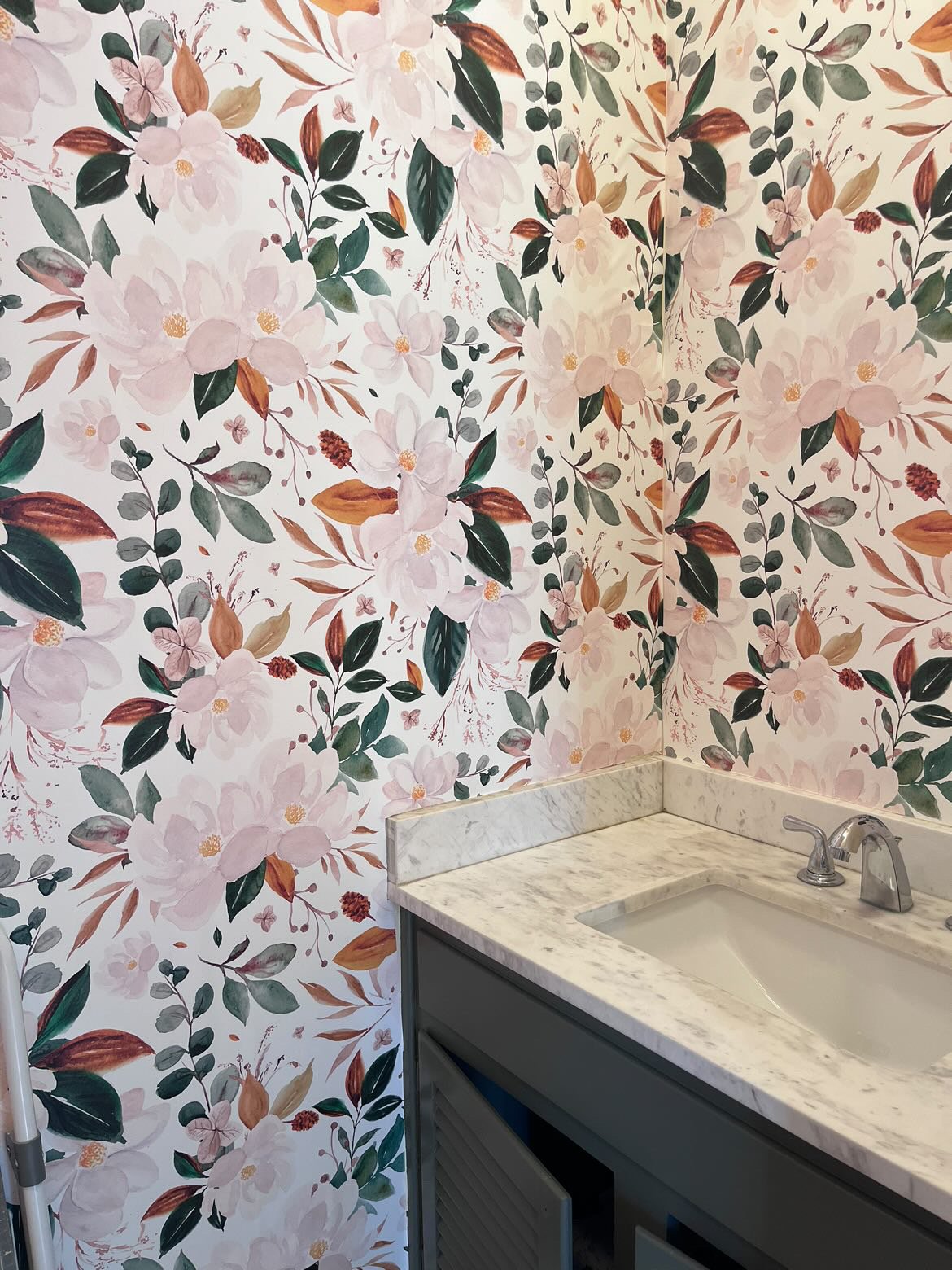 Light Gold Magnolia wallpaper installed in a customer bathroom