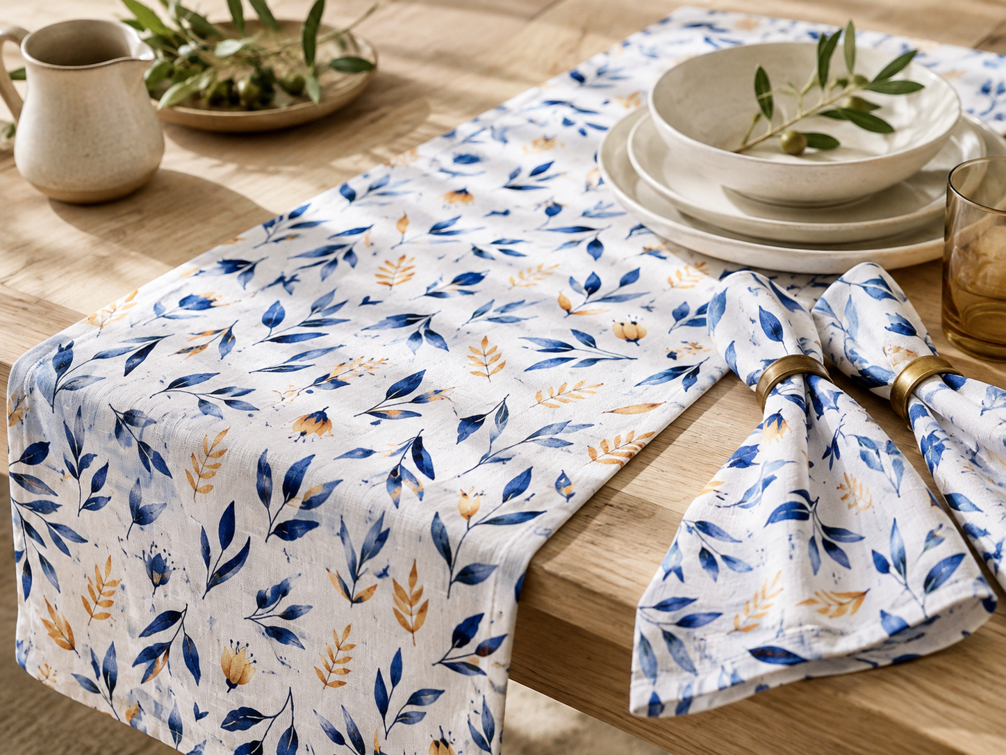 Mediterranean Meadow botanical print on a table runner and napkins in a styling concept